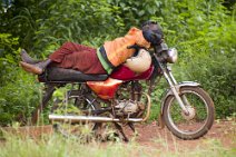 6: Mototaxi driver resting in Abomey