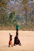 14: Mother and daughter carrying water