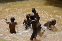 15: Kids having a bath at Caplaki market in Kigali